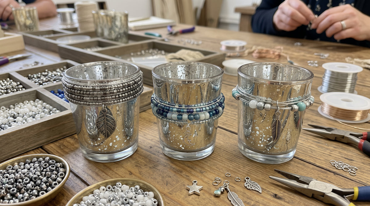 Silver mercury glass votives wrapped in beaded wire with hanging charms