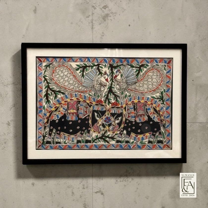 Suwanee Frame & Art framed Madhubani painting of elephants and peacocks with intricate details and vibrant colors on paper.